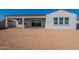 Spacious backyard featuring a covered patio, perfect for outdoor entertaining and relaxation at 35703 N Geode Way, San Tan Valley, AZ 85144