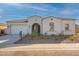 Inviting single-Gathering home with a well-maintained front yard and charming architectural details at 35703 N Geode Way, San Tan Valley, AZ 85144