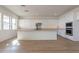 Gourmet kitchen with a large island, stainless steel appliances, and modern finishes at 35703 N Geode Way, San Tan Valley, AZ 85144