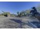 Community area featuring a walking path, desert landscaping, public art installations, and scenic views at 37170 N Greythorn Cir, Carefree, AZ 85377