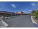 A clean commercial area with desert landscaping in a community retail shopping center at 37170 N Greythorn Cir, Carefree, AZ 85377