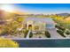 Attractive house with desert landscaping, a tile roof, and an attached two-car garage, front lawn and walkway at 37170 N Greythorn Cir, Carefree, AZ 85377