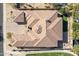 Expansive tile roof detail on this impeccably designed home with desert landscaping at 3822 E Tracker Trl, Phoenix, AZ 85050
