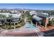 Aerial view of Desert Ridge Marketplace shopping center with restaurants and retail stores at 3822 E Tracker Trl, Phoenix, AZ 85050