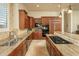 Well-appointed kitchen with stainless steel appliances, tile backsplash and a center island for cooking prep at 3822 E Tracker Trl, Phoenix, AZ 85050