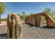 Community playground featuring a climbing wall and large boulder for fun and active play at 3822 E Tracker Trl, Phoenix, AZ 85050
