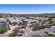 Community school featuring modern buildings, solar panels and well-maintained grounds at 3822 E Tracker Trl, Phoenix, AZ 85050