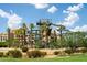Gathering friendly waterpark featuring thrilling water slides, palm trees, and a resort in the background at 3822 E Tracker Trl, Phoenix, AZ 85050