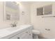 Bright bathroom featuring a modern vanity, neutral walls, and a convenient toilet at 3861 S Acacia Ct, Chandler, AZ 85248