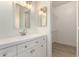 Updated bathroom featuring a modern vanity, sleek fixtures, and a seamless mirror, perfect for everyday routines at 3861 S Acacia Ct, Chandler, AZ 85248