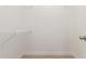 Walk-in closet with metal shelving and plenty of storage space at 3861 S Acacia Ct, Chandler, AZ 85248