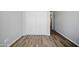 Bedroom with a closet and wood-look floors at 39894 N Fazio Ln, San Tan Valley, AZ 85140