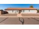 Single-story home with a desert-landscaped front yard and an inviting front porch at 39894 N Fazio Ln, San Tan Valley, AZ 85140