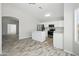 Open-concept kitchen with stainless steel appliances and ample counter space at 39894 N Fazio Ln, San Tan Valley, AZ 85140