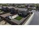Aerial view of the home showcases a backyard with artificial turf and a gazebo at 40866 W Sanders Way, Maricopa, AZ 85138
