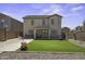 Backyard featuring an artificial grass area, a patio, and fencing at 40866 W Sanders Way, Maricopa, AZ 85138