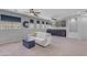 Spacious bonus room featuring large windows, comfortable seating, and built-in storage, perfect for entertainment at 4455 E Palmdale Ln, Gilbert, AZ 85298