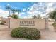 Seville Golf & Country Club community sign with manicured landscaping and stone accents at 4455 E Palmdale Ln, Gilbert, AZ 85298