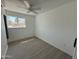 Bright bedroom with a window and natural light and neutral walls, ideal for relaxation and personalization at 5024 W Osborn Rd, Phoenix, AZ 85031