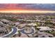 Desert community with sprawling residences, showcasing the beauty of the surrounding landscape at sunset at 5448 E Windstone Trl, Cave Creek, AZ 85331