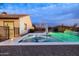 Backyard pool with spa, lounge chairs, and desert landscaping at 5448 E Windstone Trl, Cave Creek, AZ 85331