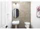 Stylish powder room with mosaic tile, a modern sink, and elegant fixtures at 5448 E Windstone Trl, Cave Creek, AZ 85331
