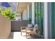 Relaxing balcony with outdoor seating and mountain views at 5455 E Lincoln Dr # 3008, Paradise Valley, AZ 85253