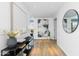 The hallway features sleek console table, neutral decor, and contemporary artwork at 5455 E Lincoln Dr # 3008, Paradise Valley, AZ 85253