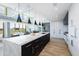Modern kitchen with island, pendant lights, and open floorplan concept at 5455 E Lincoln Dr # 3008, Paradise Valley, AZ 85253