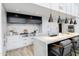 Modern kitchen featuring stainless steel appliances, granite countertops, and stylish hanging lights at 5455 E Lincoln Dr # 3008, Paradise Valley, AZ 85253