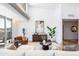 Stylish living room with modern decor, natural light, comfortable seating, and elegant furnishings at 5455 E Lincoln Dr # 3008, Paradise Valley, AZ 85253