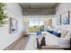 Stylish primary bedroom with exposed concrete ceilings and a view of the outdoors at 5455 E Lincoln Dr # 3008, Paradise Valley, AZ 85253