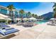 A relaxing pool area with lounge chairs, mountain views, and plenty of sunshine at 5455 E Lincoln Dr # 3008, Paradise Valley, AZ 85253