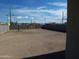 A spacious backyard with a perimeter fence at 592 E 9Th Ave, Apache Junction, AZ 85119