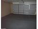 An empty and organized garage featuring a gray floor at 592 E 9Th Ave, Apache Junction, AZ 85119