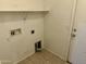 An empty laundry room ready for appliances at 592 E 9Th Ave, Apache Junction, AZ 85119