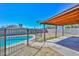 Backyard with pool, covered patio, and block fence at 6025 W Marconi Ave, Glendale, AZ 85306