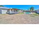 Spacious backyard featuring a pool, covered patio, and privacy fence at 6025 W Marconi Ave, Glendale, AZ 85306