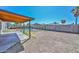 Spacious backyard with covered patio, pool, block fence, and ample potential for outdoor enjoyment at 6025 W Marconi Ave, Glendale, AZ 85306