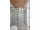 This bathroom features a walk-in shower with a river rock shower floor at 6025 W Marconi Ave, Glendale, AZ 85306