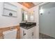 Stylish bathroom featuring a vessel sink, wood accents, and modern fixtures at 6025 W Marconi Ave, Glendale, AZ 85306
