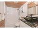 Updated bathroom with modern vessel sink, granite counters, and stylish wood ceiling at 6025 W Marconi Ave, Glendale, AZ 85306