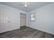 Cozy bedroom boasts a closet, window, and ceiling fan at 6025 W Marconi Ave, Glendale, AZ 85306