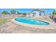 Backyard pool surrounded by a concrete deck, perfect for cooling off on hot summer days at 6025 W Marconi Ave, Glendale, AZ 85306