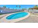 Backyard pool with clear blue water, surrounded by concrete and a privacy fence at 6025 W Marconi Ave, Glendale, AZ 85306