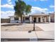Charming single-story home with a covered parking and low-maintenance landscaping at 6201 W Acoma Dr, Glendale, AZ 85306