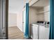 Dedicated laundry area is conveniently located with modern washer and dryer at 6201 W Acoma Dr, Glendale, AZ 85306
