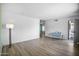 Bright living room featuring neutral walls and flooring and an open floor plan at 6201 W Acoma Dr, Glendale, AZ 85306