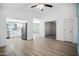 Open living space with updated kitchen and views into the bedrooms at 6201 W Acoma Dr, Glendale, AZ 85306