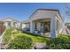 Enjoy this manicured backyard featuring an extended covered patio and lush artificial grass at 6334 E Viewmont Dr # 29, Mesa, AZ 85215